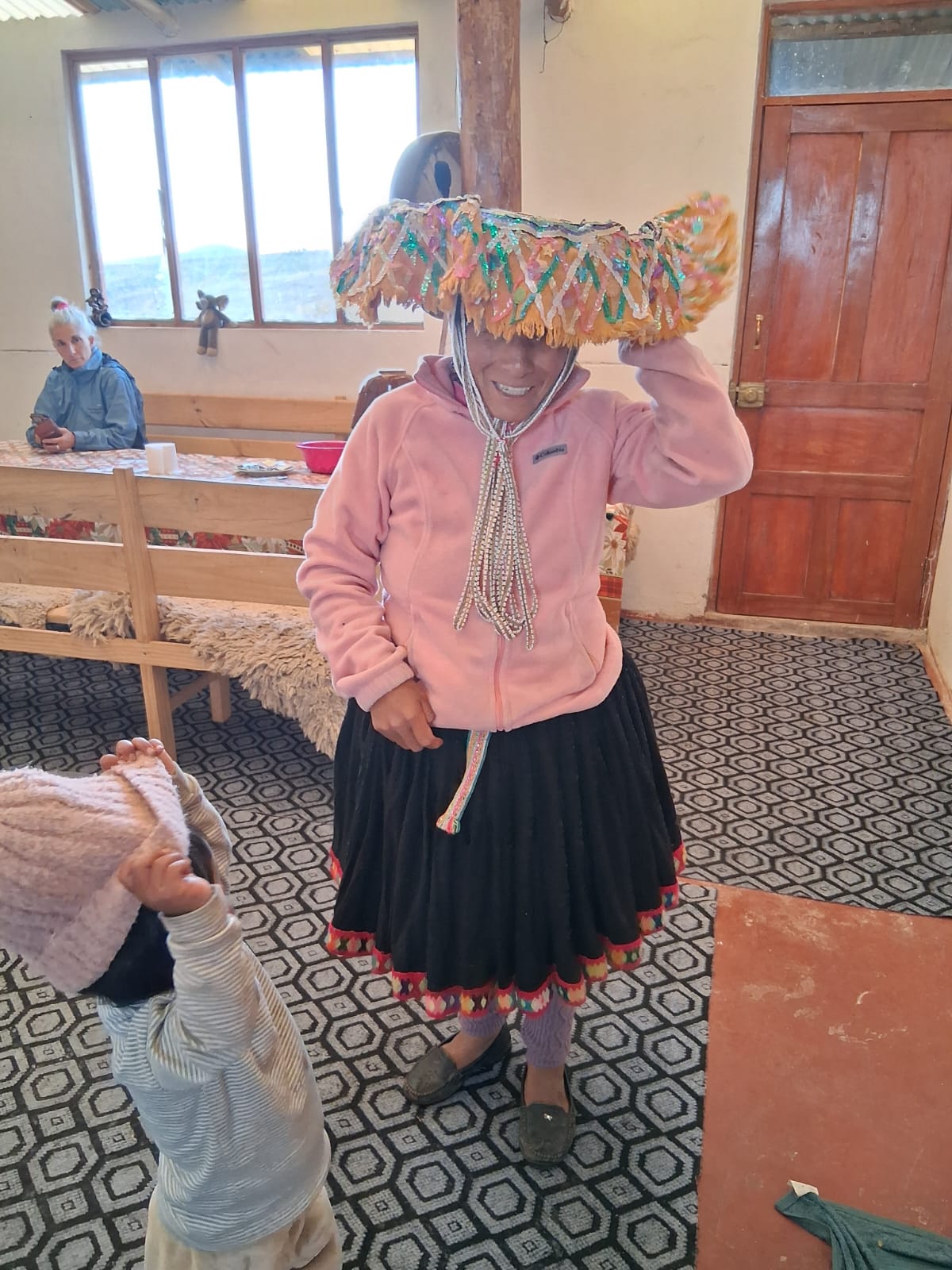 Armanda holding a colourful decorated drum